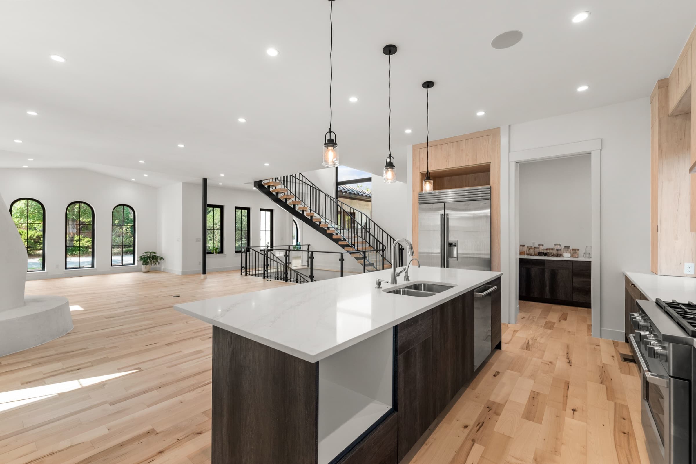 Kitchen island looking through to the great room and stair